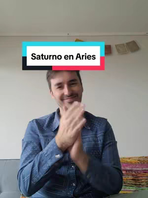 A man smiling with his hands clasped together, with text overlayed.