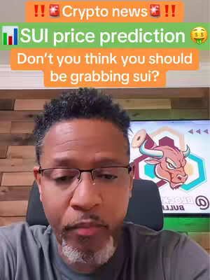 A man in glasses is centered, looking at the camera. Text overlays include headline-style announcements and call-to-action prompts. Behind him, a modern TV displays a graphic with a bull.