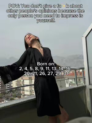 A woman stands on a balcony with her arms outstretched, gazing upwards with an expression of serenity. She's wearing a dark, flowing robe or dress. Text overlays appear on the image, including inspirational messages and numerical lists.