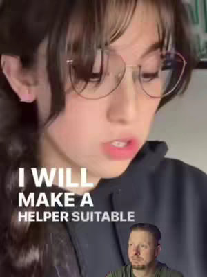 A cover image with a woman in glasses and a black hoodie, speaking. Below her, a man is seen with short brown hair. Text overlay on the image reads, "I WILL MAKE A HELPER SUITABLE".