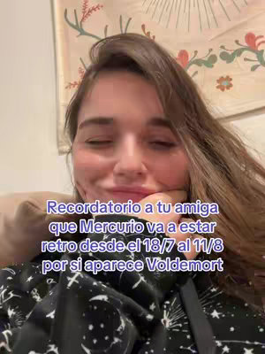 A selfie-style shot, featuring a young woman looking at the camera with a slight smile. She has long, dark hair. The background is blurred, showing a patterned fabric. The overlay text is in the bottom portion of the image.