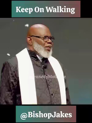 The image is a screen capture of a video featuring a man of African descent wearing glasses and dressed in a suit jacket and a white clerical collar. The background is a blurred gray. Text overlays read "Keep On Walking" at the top in a green and black banner and "@BishopJakes" at the bottom in a green and black banner. The man is speaking.