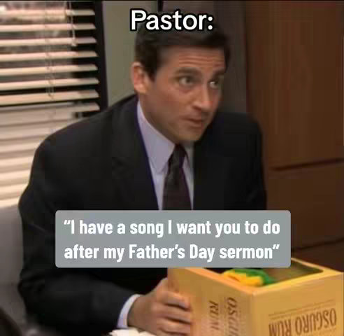 A meme-style image from the TV show 'The Office'. Michael Scott, wearing a suit, is looking directly at the viewer with a surprised expression. Text overlays are added to the image. He's holding a box that says 'OSCURO RUM'.