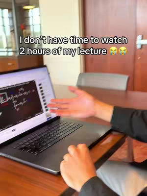 A person is seen in a setting that appears to be an office or study, holding a laptop. The person is gesturing towards the screen, which displays what seems to be a learning platform UI. Text overlayed on this image reads "I don't have time to watch 2 hours of my lecture😭😭" 
