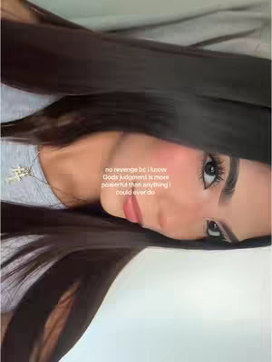 The cover image features a close-up of a woman with long dark hair, wearing a light gray shirt. The woman is centered with her head and shoulders. The background is a soft gradient of light colors. The photo is well-lit, with a focus on the woman's face, where text is overlaid.