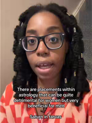 A woman with dark hair in braids and glasses is centered in the frame. Text overlays appear at the image's bottom, where the creator explains, in a bright red and white top.