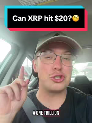 A man is filmed from the chest up inside a car, with a bright screen overlayed at the top. The overlay asks, "Can XRP hit $20?" The man is wearing glasses and a hat, and he is pointing his index finger upwards. A text overlay along the bottom reads, "A ONE TRILLION". The background subtly shows the car's interior and the outside environment.