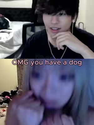 The cover image is a split screen, featuring two individuals. The top half shows a young man with dark hair and a black t-shirt, looking slightly surprised. The bottom half showcases a blurry image of a woman with blonde hair. The text overlay 'OMG you have a dog' is positioned between the two images, in a pink font.