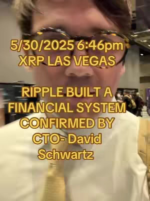 A selfie-style video cover image featuring a man wearing glasses and a white shirt with a tie. Text overlays give context of the video to the viewer.