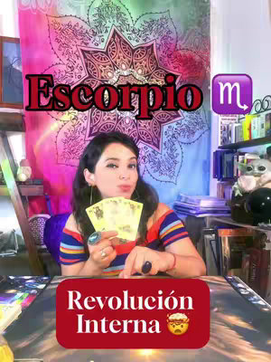 The cover image features a woman holding up tarot cards, positioned in front of a colorful tapestry. Text overlays read 'Escorpio' in bold, black letters atop a red banner that says 'Revolución Interna'. The background includes astrological symbols.