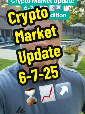 A selfie-style video cover featuring a man in a blue shirt, with overlay text announcing a crypto market update. The text is enclosed in black outlines and set against a blurred background of a yard and a pool. Supplemental graphics enhance the crypto theme.
