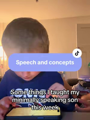 A young child wearing a blue shirt is seated, with their face mostly obscured by a blue overlay containing white text. The child appears to be interacting with a phone, visible in the foreground. Additional text is overlaid at the bottom, and the background subtly includes elements of an interior setting.