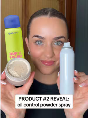 A woman with fair skin and dark, slicked-back hair is the central focus, holding two beauty products. To her left, she presents a bright yellow spray bottle with dark blue accents and the words "Quick Faced." In her right hand, she holds small, white spray bottle. A small, open jar of a light-colored powder is visible in her left hand in the center of frame.