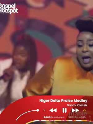 The cover features a performance shot with a woman singing, a reddish-orange and blurred background, and a music player overlay.