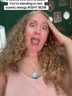 A woman with curly blonde hair and a surprised expression gasps, with her mouth open and one hand to her forehead. Text overlay is positioned above the woman's head.