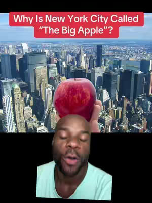 The cover image is split into two main sections. The top half is a view of a city skyline, with a clear focus on a large, red apple held in a hand. The background shows tall buildings and a blue sky. The bottom half shows a Black man with short hair, a light blue t-shirt, and visible facial expressions, looking up, as if he is talking