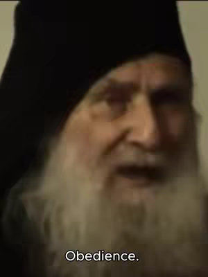 A close-up shot of an elderly man with a long white beard wearing a black head covering. The man is looking slightly off-center and speaking, with the word 'Obedience' overlaid at the bottom.