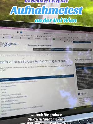 A laptop screen displaying a university website with information about an entrance exam. The screen fills most of the frame, with the keyboard visible at the bottom. Text overlays appear at the top and bottom, and the background is slightly blurred.