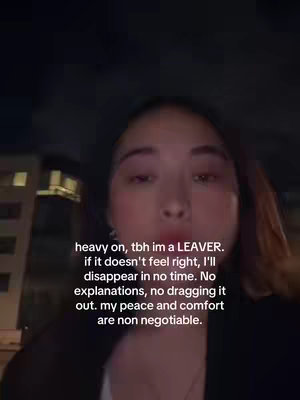 A selfie-style shot of a woman looking at the camera. Text overlayed on the image provides context.