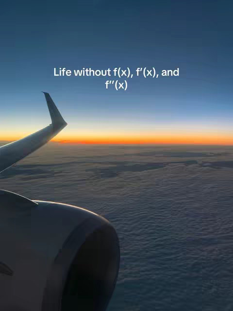 An image taken from inside an airplane, looking out towards a vibrant sunset over a cloud layer. The plane's wing and engine are visible in the foreground, partially obscuring the view, with overlaid text.