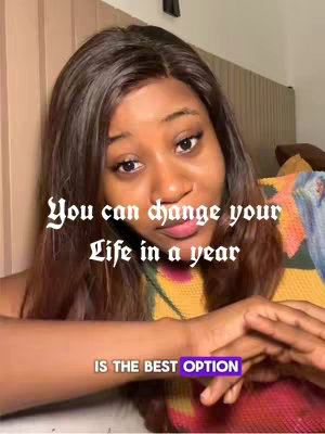 A selfie taken with a well-lit indoor setting. The woman is captured from the chest up, her face filling the frame. She has dark hair and is positioned slightly off-center. Text overlays, in a contrasting font, are added to the frame. The background is softly out of focus. Her arms frame the shot. The composition appears to be designed for a social media context.