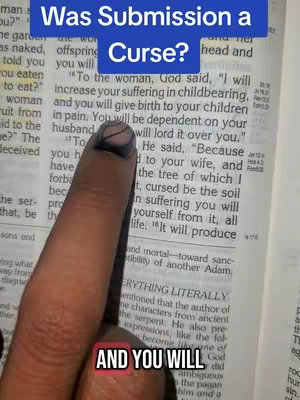 A person's finger is pointing to text in an open Bible. Above, overlay text reads 'Was Submission a Curse?' The image has a close-up view.