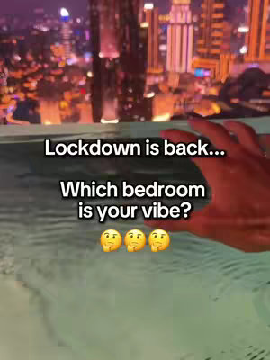 The cover image shows a nighttime cityscape in the background, with blurred lights and tall buildings. In the foreground, there's a body of water, likely a pool or a reflective surface, with a hand reaching into the frame from the right side. Text overlays are centered on the image, and there are yellow emoji faces.
