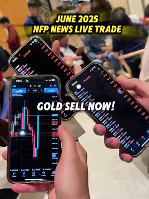 The image shows three smartphones held by different hands. The focus is on the screens displaying financial data, including charts and numerical information related to trading. The phones have a mostly black interface with colored lines and indicators. Above the phones, a text overlay displays the words 'JUNE 2025 NFP NEWS LIVE TRADE' in a bold, yellow font. Below the phones text overlay says 'GOLD SELL NOW!' in white font. In the background, portions of other people are seen, suggesting a public setting or a group of individuals. The overall composition is designed to capture attention with its direct text and real-time data presentation.