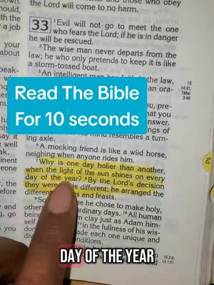 The image shows an open Bible with highlighted text and a blue overlay containing text. A hand is pointing at the highlighted text. The layout is centered on the open book, with the text overlay positioned in the middle of the image, and the hand at the bottom.