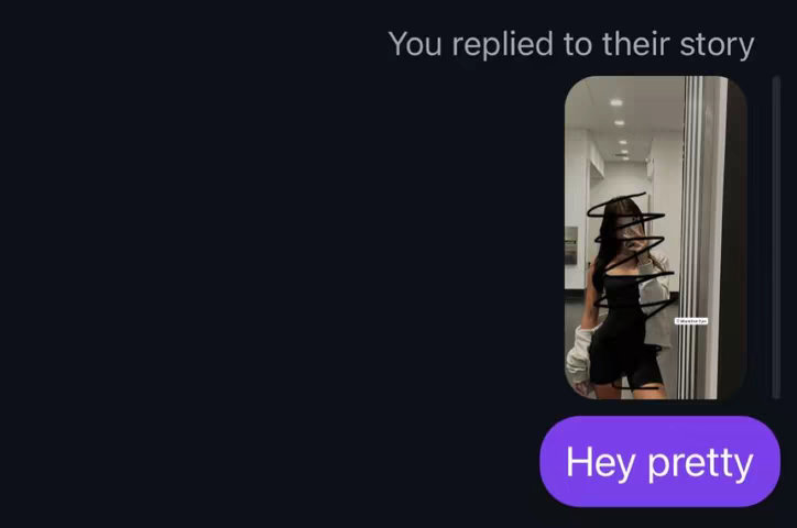 A screenshot of a chat conversation. A woman is in front of a mirror in a hallway, wearing a black outfit and a light-colored jacket. The chat bubble reads "Hey pretty".