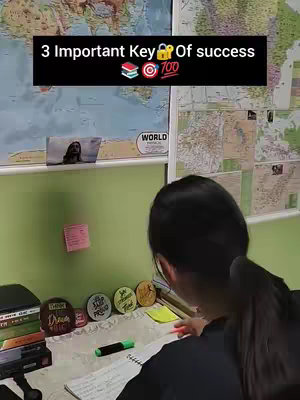 A woman is sitting at a desk, facing away from the camera, studying. The desk is cluttered with books, notes, and a highlighter. Behind her, a wall is adorned with maps, and a text overlay at the top reads '3 Important Key Of success' with various icons.