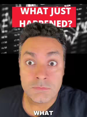A cover image featuring a man with wide eyes, positioned with a red banner overlaying the top that reads 'WHAT JUST HAPPENED?'. Behind him, a blurred background displays stock market data. The composition is centered, with the man's face taking up the majority of the frame, generating an immediate attention-grabbing effect.