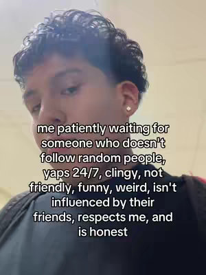 A young man with dark hair and a stud earring is shown from the chest up, angled slightly to the side. He's looking towards the camera in a self-shot. Overlayed on the image is a message in a white, sans-serif font.