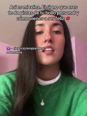 A woman with long dark hair and a green shirt is shown from the chest up, slightly off-center. Text overlays are at the top and bottom. She's looking towards the camera; the background is a light pink color.
