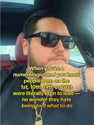 A man wearing sunglasses is in the driver's seat of a car, with text overlayed describing numerological concepts.