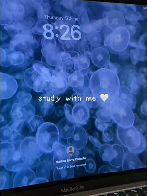 The image shows a computer screen with a blue background featuring an abstract design, possibly of jellyfish. Text overlays in white say "study with me". The time 8:26 is visible at the top of the screen, along with "Thursday, 5 June". The bottom corner shows the MacBook Air model.