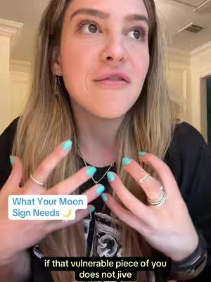 The cover image features a woman's face with hands in the frame, with a text overlay on the bottom left. She has blonde hair, and a soft facial expression, with clear eye makeup and turquoise nail polish. She's centered against a backdrop, likely indoors, with soft lighting.