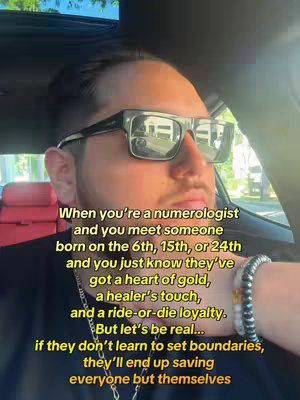 A man with a beard wears sunglasses while sitting in a car. Text is overlaid on top of the image, which features a dark background.