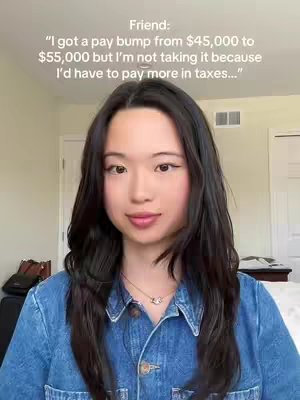 A medium close-up shot of a woman with dark hair in a denim shirt, looking at the camera. Text overlayed above quotes a friend's concerns about a pay raise and taxes.
