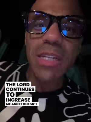 A close-up shot of a man wearing glasses, with a black and white patterned shirt. The man is looking towards his right, and below him text is overlaid that says 'The Lord continues to increase me and it doesn't'.