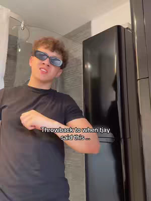 The cover image shows a young man wearing sunglasses in what seems to be a bathroom. Text overlayed says, "Throwback to when tjay said this ...". The background consists of a shower and dark colored cabinets.