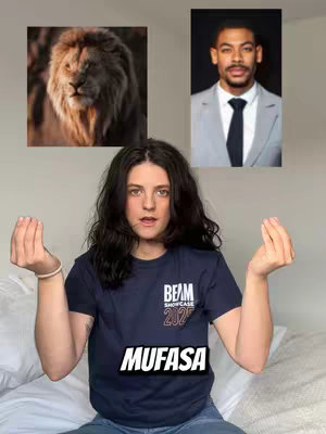 The cover image features a person in a navy blue t-shirt, gesturing with both hands, with the word "MUFASA" in a white box beneath them. To the left is an image of a lion's face, and to the right is a headshot of a man. The composition is balanced, with the central figure taking up the most space.