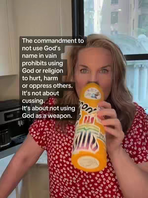 A woman in a red floral print shirt holds a yellow and orange bottle up to her face and a window is in the background. Overlayed text is present on the top left of the screen.