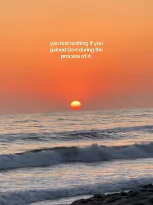 A serene image of a sunset over the ocean. The sky transitions from a vibrant orange at the horizon to a lighter shade above. The sun is a bright yellow circle near the horizon line. Gentle waves roll towards the foreground. White text is overlaid near the top center.