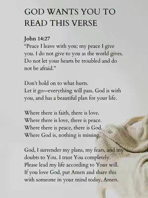 A photograph of a white background with a few lines of text in black, and beside it is a folded white blanket.