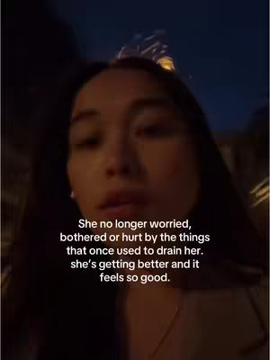 A selfie-style video cover image showing a woman in an outdoor setting at dusk. The woman is the primary focus, with the background appearing blurred. Text overlay is centered, placed below her face, and presents a message about personal growth.