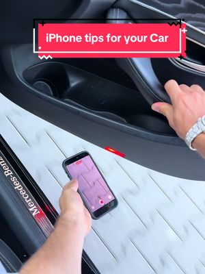 The cover image shows a close-up of the inside of a car, with the focus on a person's hand holding a smartphone. The phone's screen is active, displaying a recording interface. The car's interior is black, with a textured door panel and a portion of the car door handle visible. The image is overlain with the text 'iPhone tips for your Car' in a red rectangular label.