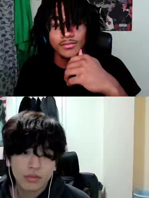 The cover image shows a split-screen view with two young men. The top half features a man with dreadlocks, glasses, and a black shirt, looking down with a serious expression. The bottom half shows another man with dark hair looking at the camera with a neutral expression, he is wearing black clothes and earphones. The background is a neutral color.