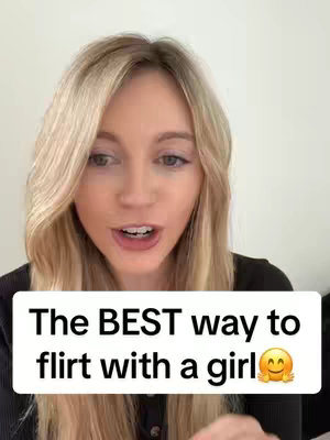 A woman with long blonde hair looks directly at the camera with a slightly open mouth, above a white rectangular text box with text and an emoji.
