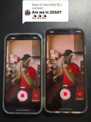 The cover image shows a phone displaying a video of a person dancing in a restaurant setting, with a question bubble overlayed above. A second phone on the left  mirrors the same video. The person is wearing a red shirt and black cap. The background is slightly blurred, suggesting movement. The overall layout is a split screen of two phones.